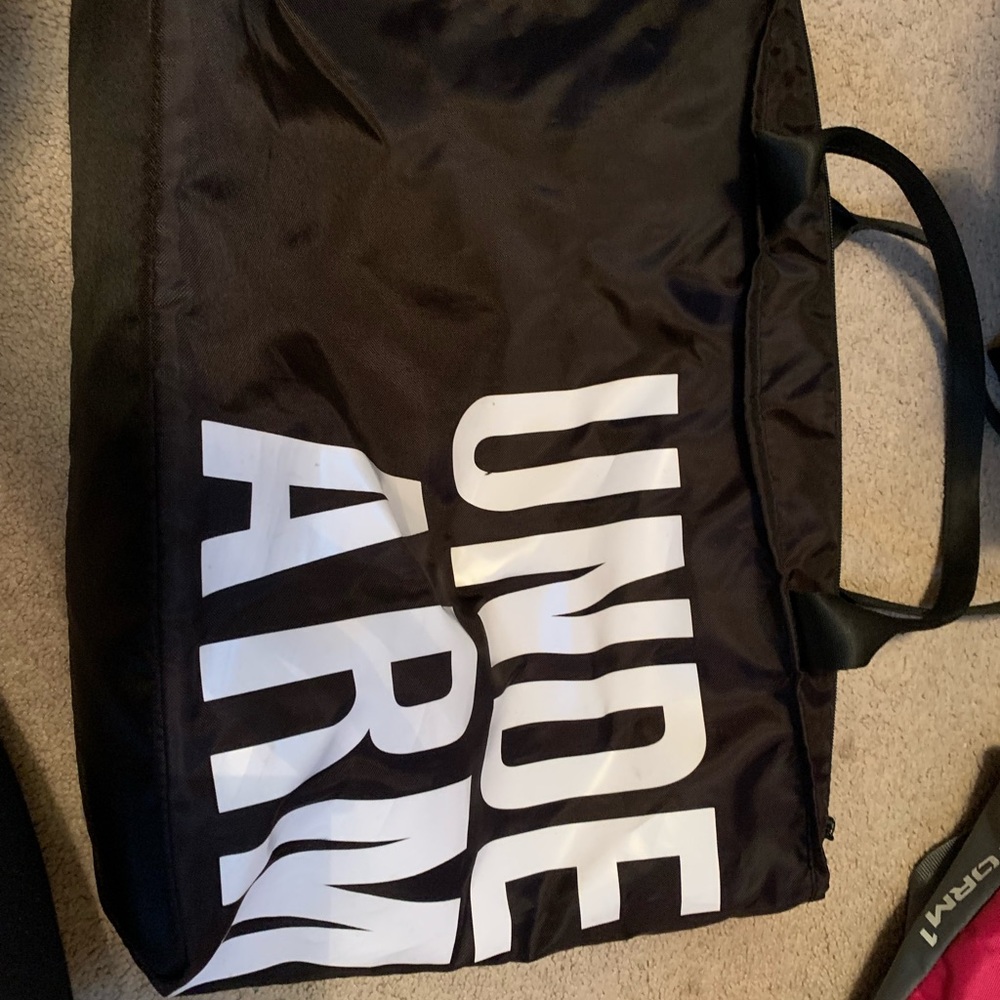 Under Amour gym bag and clutch